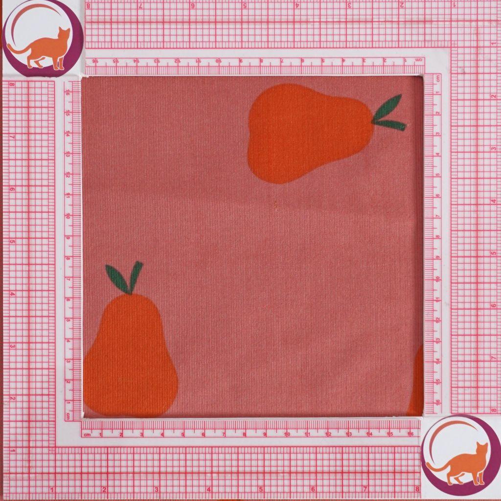 Preview: Babycord fein Birnen orange auf rosa